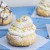 Cream Puffs topped with Chocolate and Pistachios